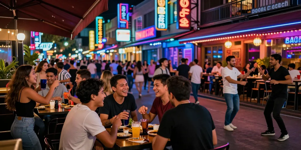Exciting nightlife scene with friends enjoying drinks at a 유흥사이트 in a vibrant entertainment district.