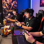 Competitive gaming scene with players enjoying MANTRA88 platform, showcasing excitement and collaboration.